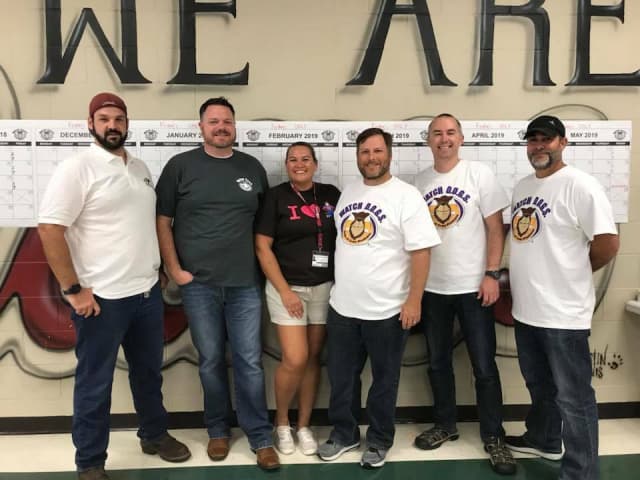 Dads at a WATCH D.O.G.S. school event