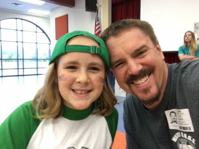 Dads connecting with students at school