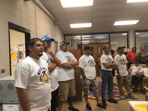 WatchDOG dad helping with a classroom activity